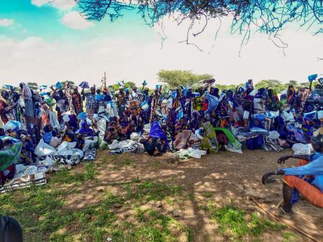 Residents of Barambate receive essential supplies during the distribution.